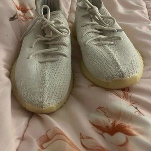 White colored Adidas Yeezys